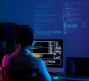 rear-view-programmer-working-all-night-long 1